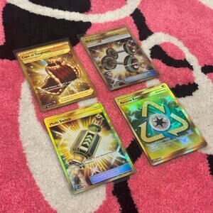 Pokémon Trainer Bundle – Dumbbells, Cape, Energy, Switch (SM Sets, Gold)